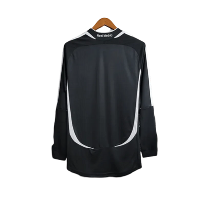 https://cdn.shopify.com/s/files/1/0826/7228/8075/files/20062007-real-madrid-benq-siemens-two-guest-retro-kit-long-sleeves-939299.webp?v=1741197431