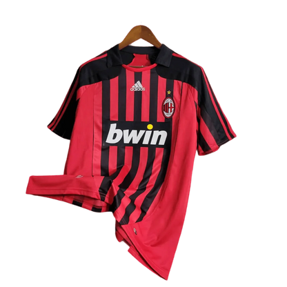 https://cdn.shopify.com/s/files/1/0826/7228/8075/files/20072008-ac-milan-bwin-home-retro-kit-489497.webp?v=1741197274