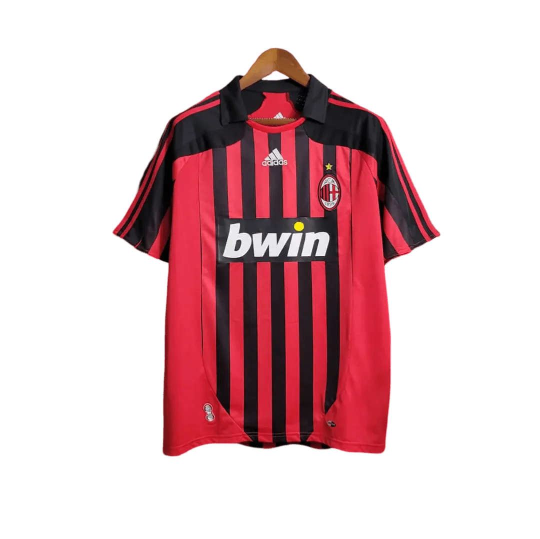 https://cdn.shopify.com/s/files/1/0826/7228/8075/files/20072008-ac-milan-bwin-home-retro-kit-560066.webp?v=1741197276
