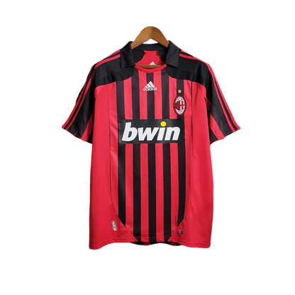 https://cdn.shopify.com/s/files/1/0826/7228/8075/files/20072008-ac-milan-bwin-home-retro-kit-560066.webp?v=1741197276