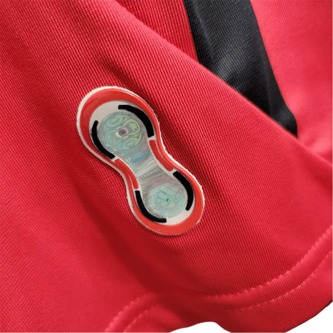 https://cdn.shopify.com/s/files/1/0826/7228/8075/files/20072008-ac-milan-bwin-home-retro-kit-817487.webp?v=1741197277