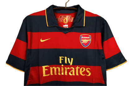 https://cdn.shopify.com/s/files/1/0826/7228/8075/files/20072008-arsenal-fly-emirates-third-retro-kit-classickits433-509804.webp?v=1741198357