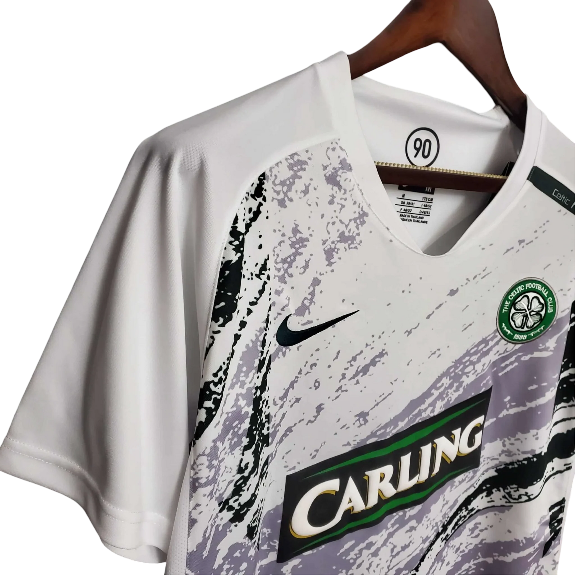 https://cdn.shopify.com/s/files/1/0826/7228/8075/files/20072008-glasgow-celtic-carling-away-retro-kit-classickits433-534088.webp?v=1741198288