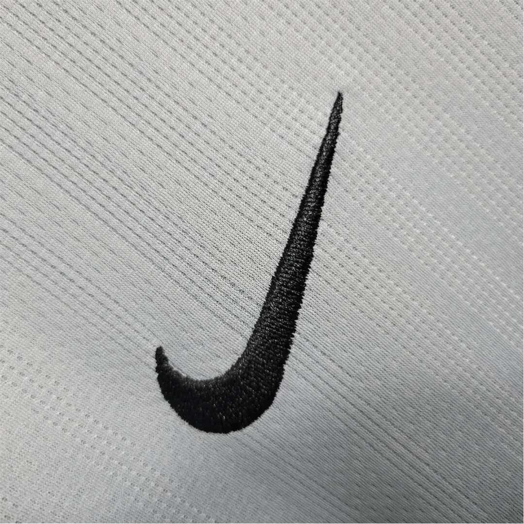 https://cdn.shopify.com/s/files/1/0826/7228/8075/files/20072008-manchester-united-aig-home-gray-goalkeeper-retro-kit-classickits433-410851.webp?v=1741197552