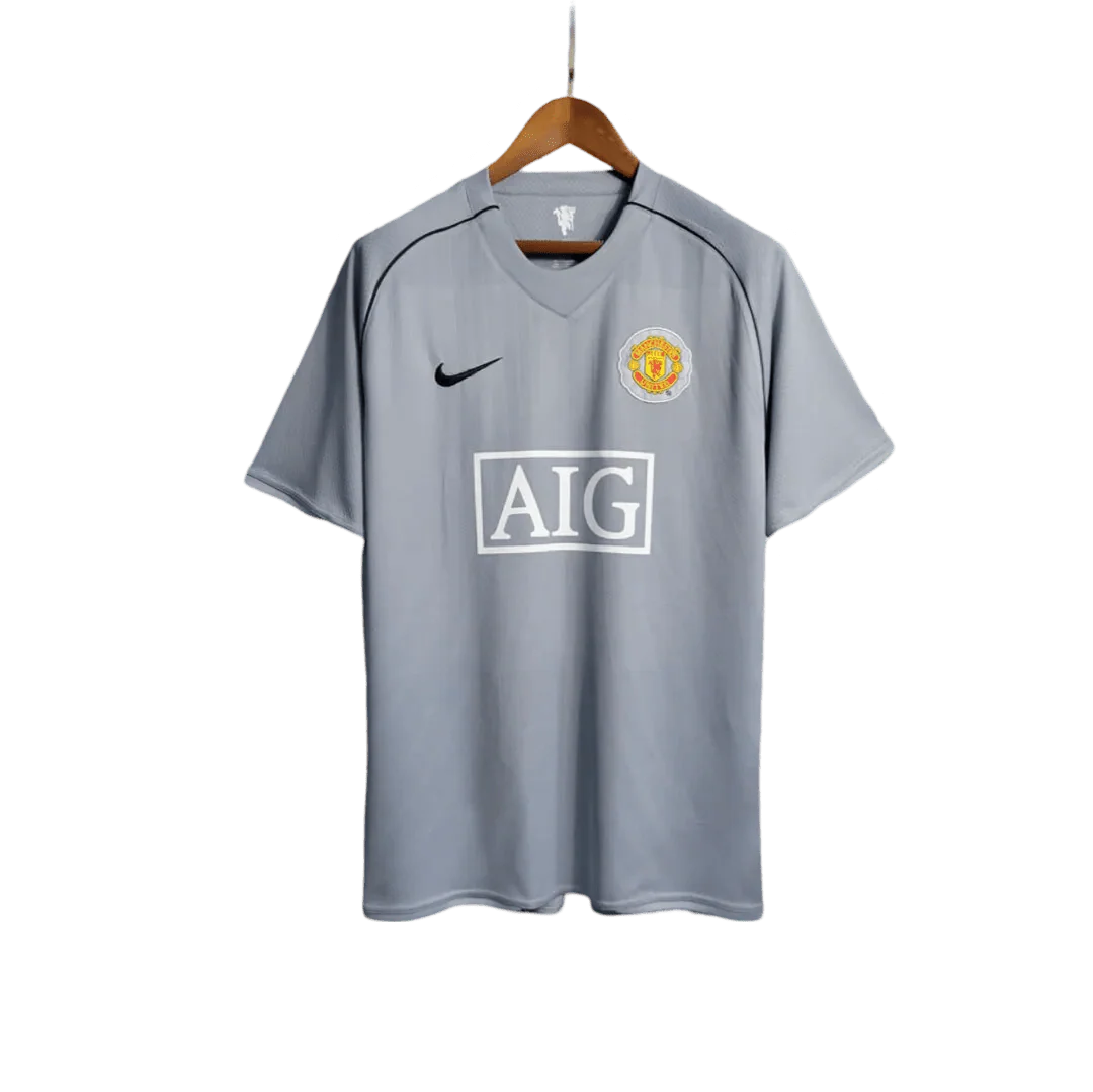 https://cdn.shopify.com/s/files/1/0826/7228/8075/files/20072008-manchester-united-aig-home-gray-goalkeeper-retro-kit-classickits433-789734.webp?v=1741197549