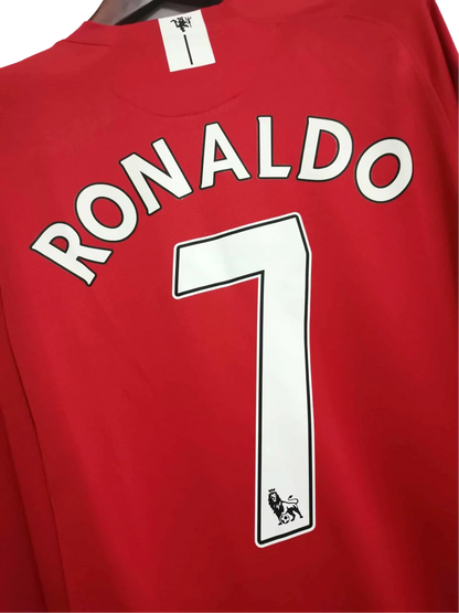 https://cdn.shopify.com/s/files/1/0826/7228/8075/files/20072008-manchester-united-aig-home-retro-kit-long-sleeve-classickits433-431550.webp?v=1741197741