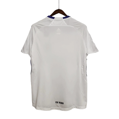https://cdn.shopify.com/s/files/1/0826/7228/8075/files/20072008-real-madrid-bwin-home-retro-kit-336245.webp?v=1741197440