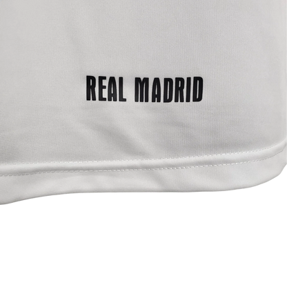 https://cdn.shopify.com/s/files/1/0826/7228/8075/files/20072008-real-madrid-bwin-home-retro-kit-419308.webp?v=1741197440