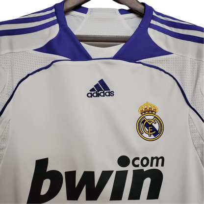 https://cdn.shopify.com/s/files/1/0826/7228/8075/files/20072008-real-madrid-bwin-home-retro-kit-684731.webp?v=1741197440