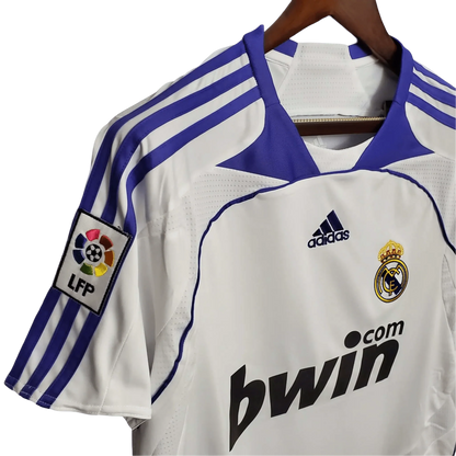 https://cdn.shopify.com/s/files/1/0826/7228/8075/files/20072008-real-madrid-bwin-home-retro-kit-869300.webp?v=1741197442