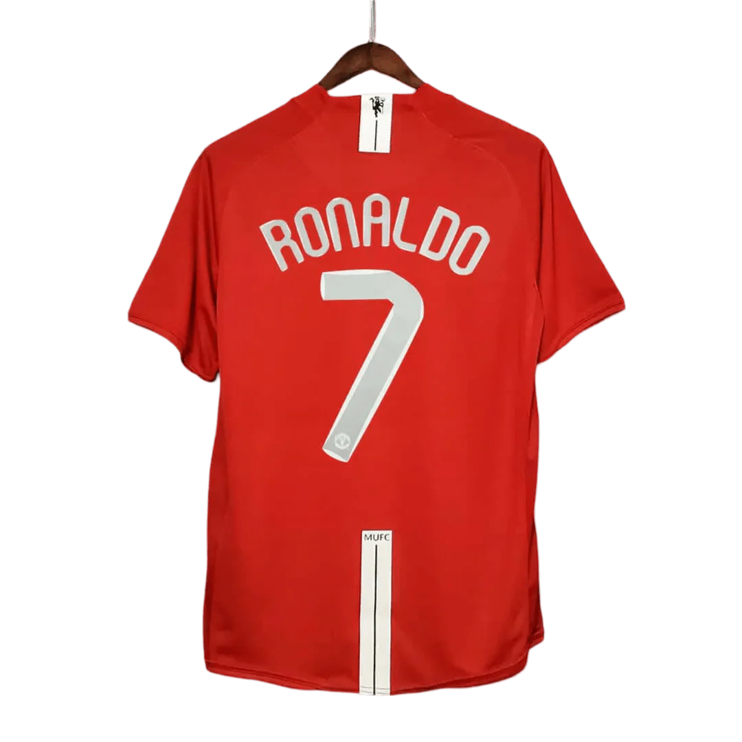 https://cdn.shopify.com/s/files/1/0826/7228/8075/files/20072009-manchester-united-aig-home-retro-kit-classickits433-179247.webp?v=1741197833