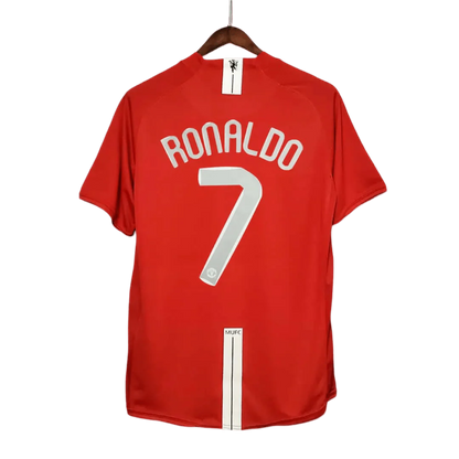 https://cdn.shopify.com/s/files/1/0826/7228/8075/files/20072009-manchester-united-aig-home-retro-kit-classickits433-179247.webp?v=1741197833