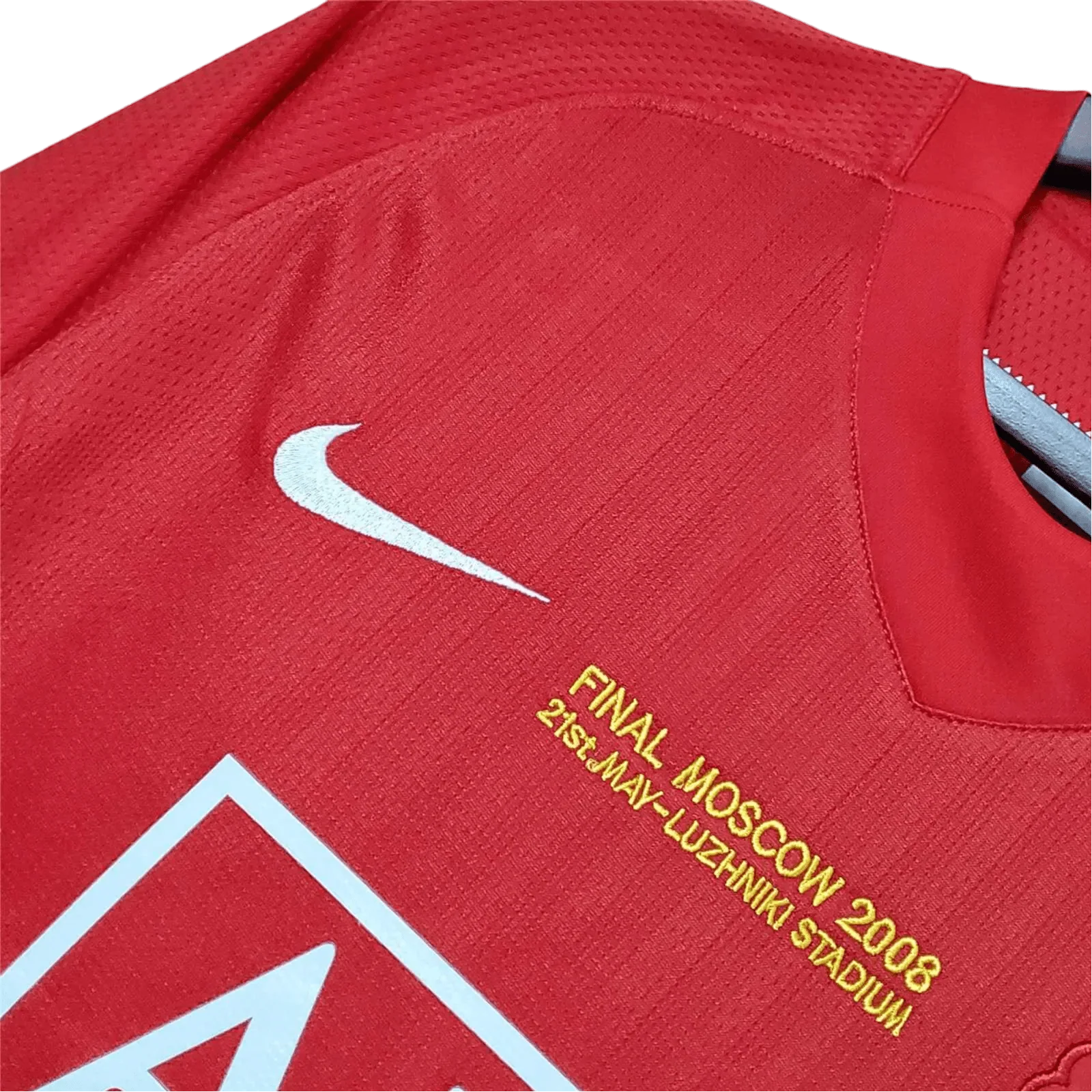 https://cdn.shopify.com/s/files/1/0826/7228/8075/files/20072009-manchester-united-aig-home-retro-kit-classickits433-214240.webp?v=1741197755