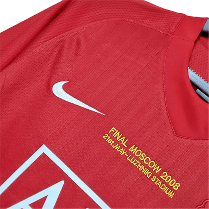 https://cdn.shopify.com/s/files/1/0826/7228/8075/files/20072009-manchester-united-aig-home-retro-kit-classickits433-214240.webp?v=1741197755