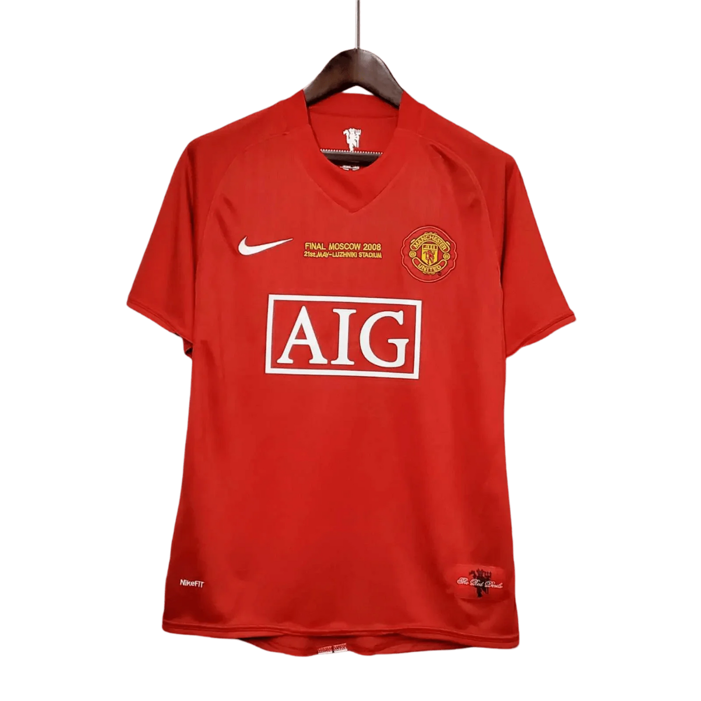 https://cdn.shopify.com/s/files/1/0826/7228/8075/files/20072009-manchester-united-aig-home-retro-kit-classickits433-279399.webp?v=1741197754