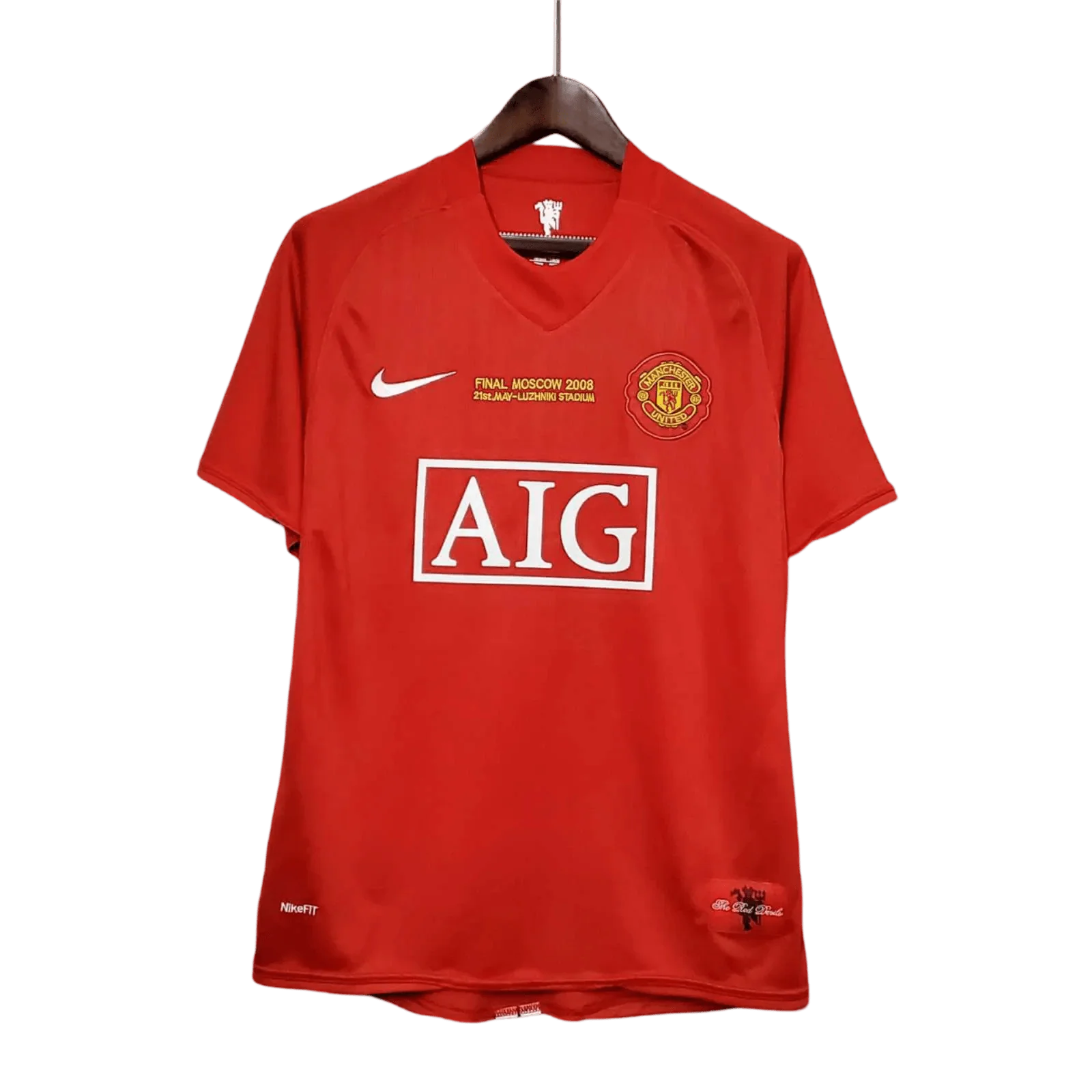 https://cdn.shopify.com/s/files/1/0826/7228/8075/files/20072009-manchester-united-aig-home-retro-kit-classickits433-279399.webp?v=1741197754