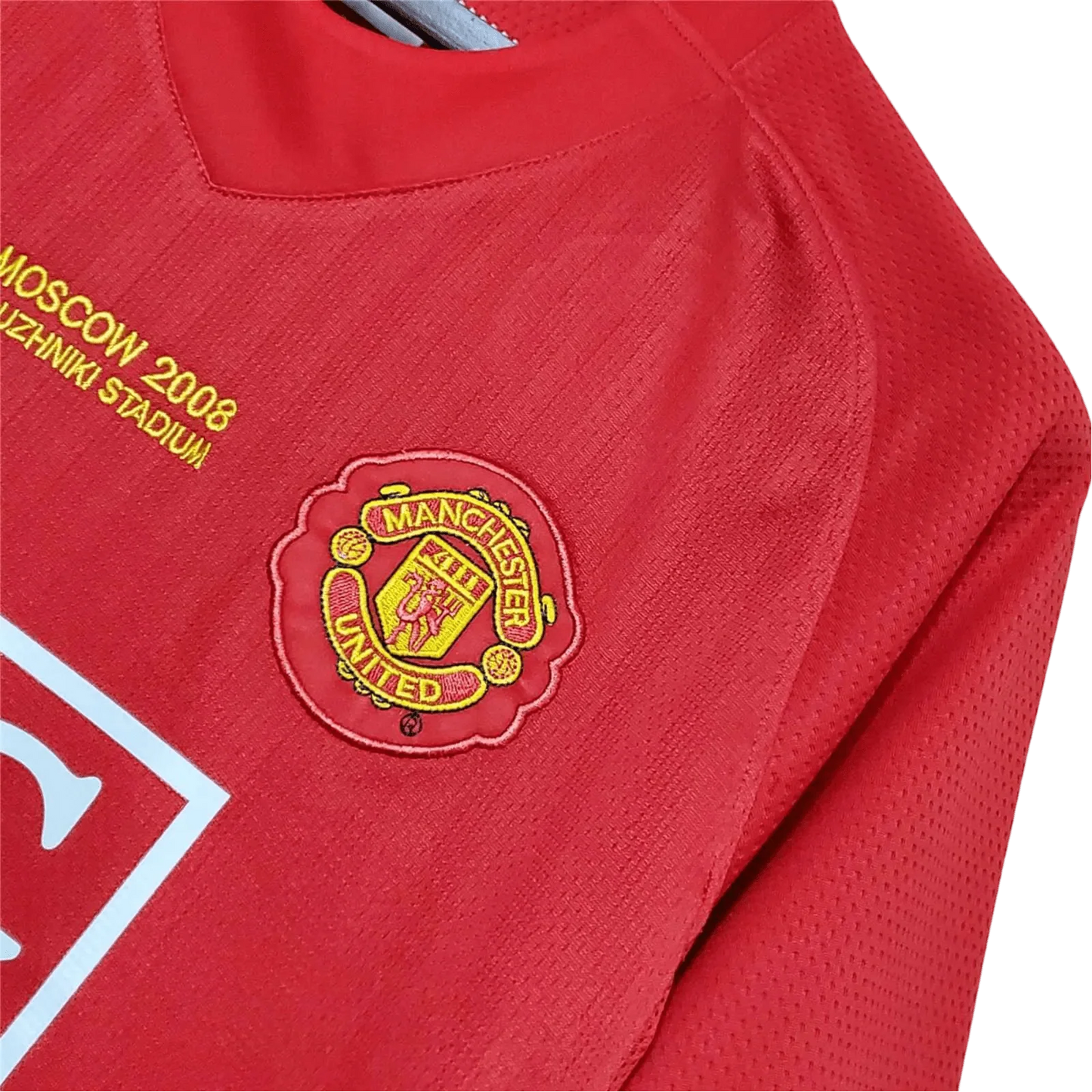 https://cdn.shopify.com/s/files/1/0826/7228/8075/files/20072009-manchester-united-aig-home-retro-kit-classickits433-325351.webp?v=1741197755