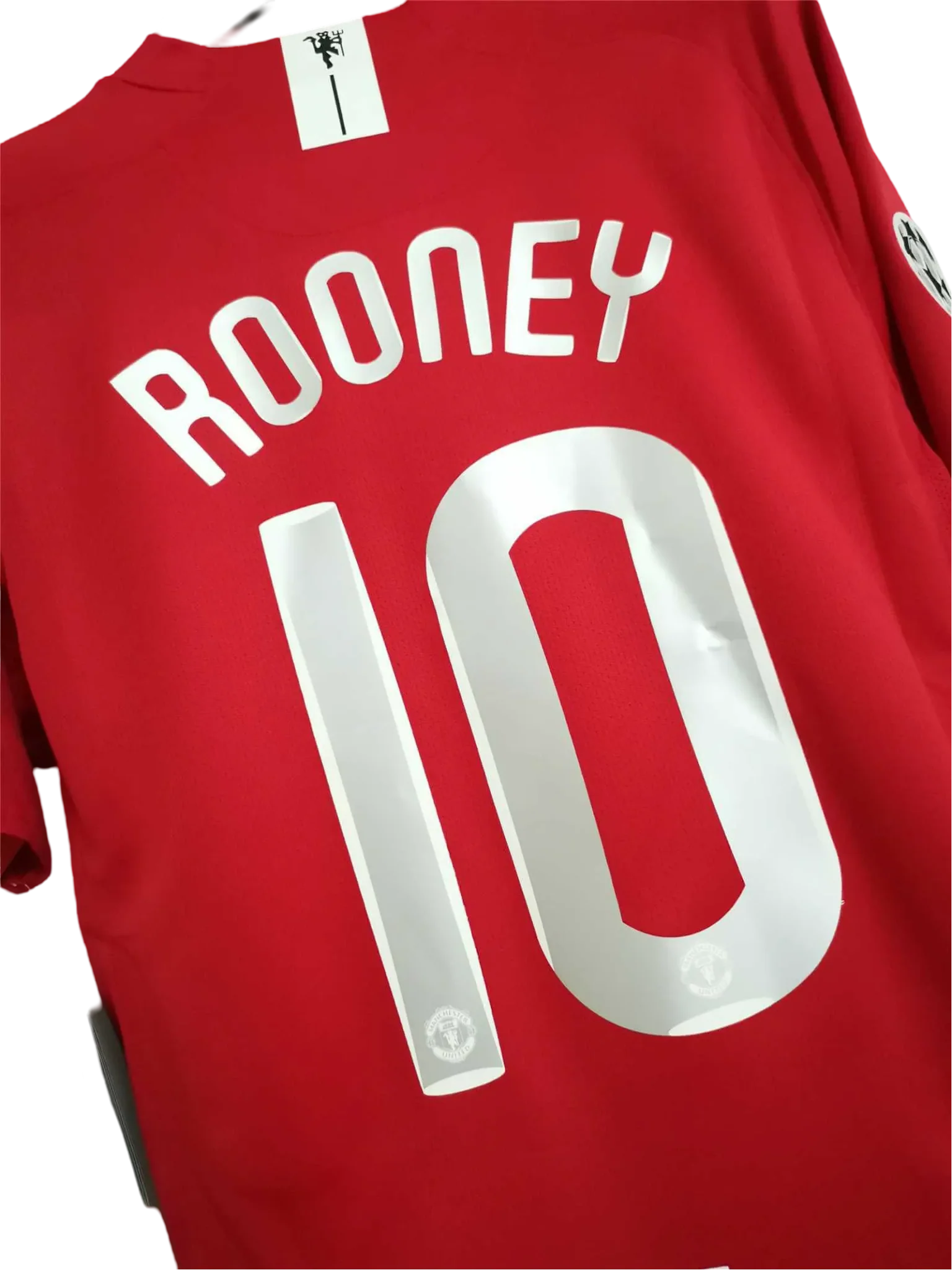 https://cdn.shopify.com/s/files/1/0826/7228/8075/files/20072009-manchester-united-aig-home-retro-kit-classickits433-369877.webp?v=1741197752