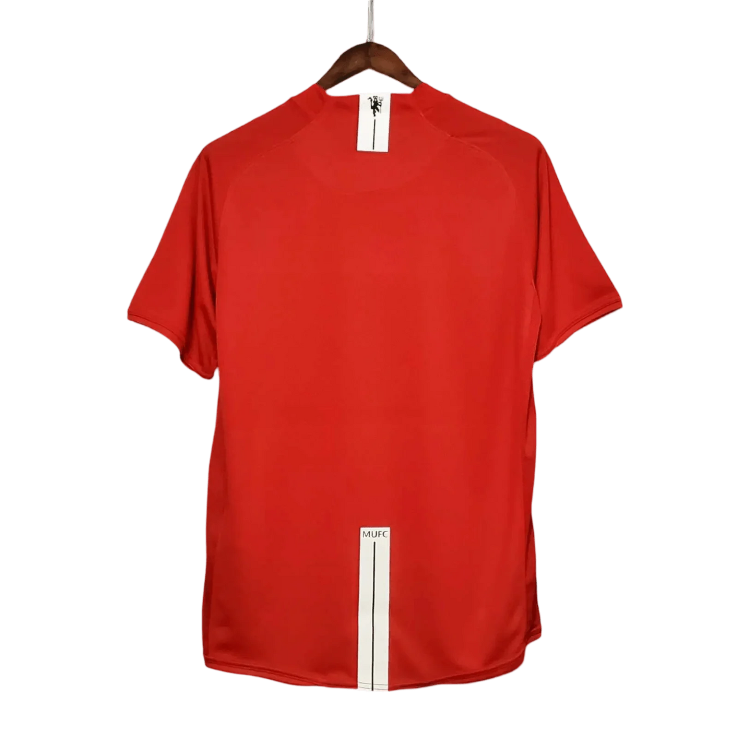 https://cdn.shopify.com/s/files/1/0826/7228/8075/files/20072009-manchester-united-aig-home-retro-kit-classickits433-543763.webp?v=1741197752