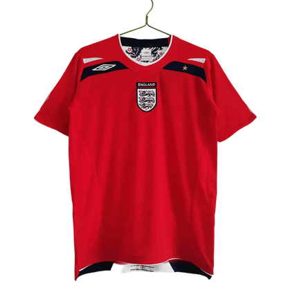 https://cdn.shopify.com/s/files/1/0826/7228/8075/files/2008-england-away-red-retro-kit-311426.webp?v=1741196953