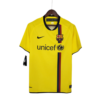 https://cdn.shopify.com/s/files/1/0826/7228/8075/files/20082009-fc-barcelona-unicef-away-retro-kit-classickits433-602891.webp?v=1741197544