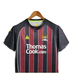 https://cdn.shopify.com/s/files/1/0826/7228/8075/files/20082009-manchester-city-thomas-cook-away-retro-kit-classickits433-888885.webp?v=1741198013