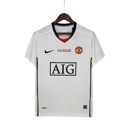 https://cdn.shopify.com/s/files/1/0826/7228/8075/files/20082009-manchester-united-aig-away-white-cl-retro-kit-classickits433-979057.webp?v=1741197749