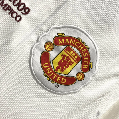 https://cdn.shopify.com/s/files/1/0826/7228/8075/files/20082009-manchester-united-aig-away-white-ucl-final-retro-kit-long-sleeves-classickits433-391501.webp?v=1741197626