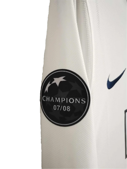 https://cdn.shopify.com/s/files/1/0826/7228/8075/files/20082009-manchester-united-aig-away-white-ucl-final-retro-kit-long-sleeves-classickits433-554502.webp?v=1741197660