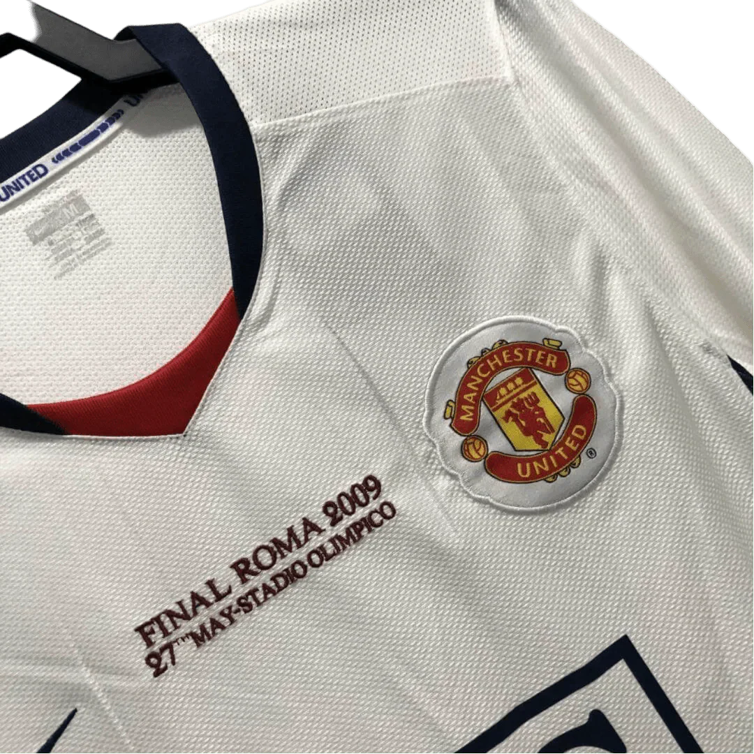 https://cdn.shopify.com/s/files/1/0826/7228/8075/files/20082009-manchester-united-aig-away-white-ucl-final-retro-kit-long-sleeves-classickits433-719989.webp?v=1741197660