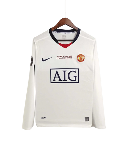 https://cdn.shopify.com/s/files/1/0826/7228/8075/files/20082009-manchester-united-aig-away-white-ucl-final-retro-kit-long-sleeves-classickits433-935822.webp?v=1741197625