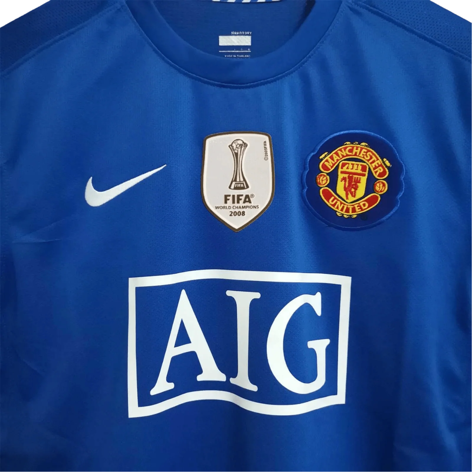 https://cdn.shopify.com/s/files/1/0826/7228/8075/files/20082009-manchester-united-aig-blue-third-retro-kit-classickits433-128747.webp?v=1741197748