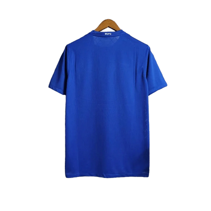 https://cdn.shopify.com/s/files/1/0826/7228/8075/files/20082009-manchester-united-aig-blue-third-retro-kit-classickits433-527531.webp?v=1741198441
