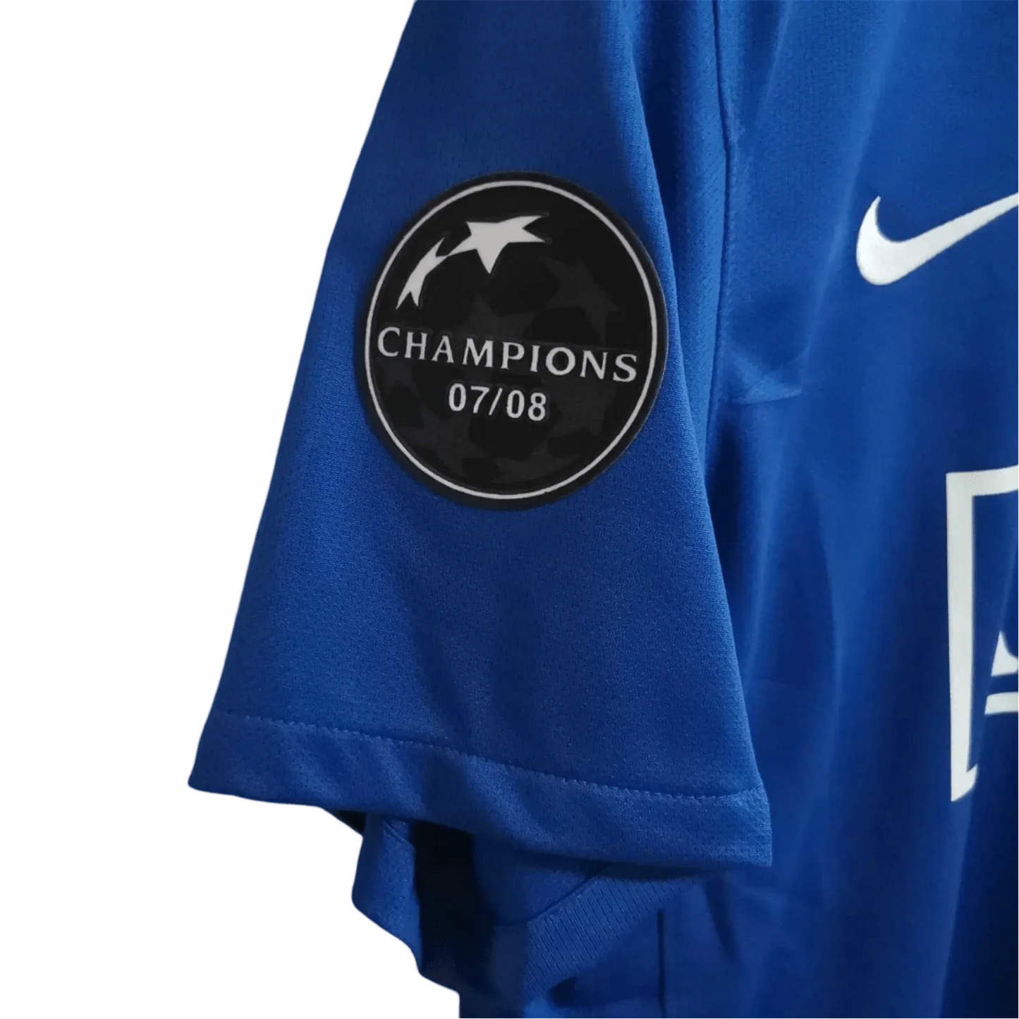 https://cdn.shopify.com/s/files/1/0826/7228/8075/files/20082009-manchester-united-aig-blue-third-retro-kit-classickits433-586291.webp?v=1741197750