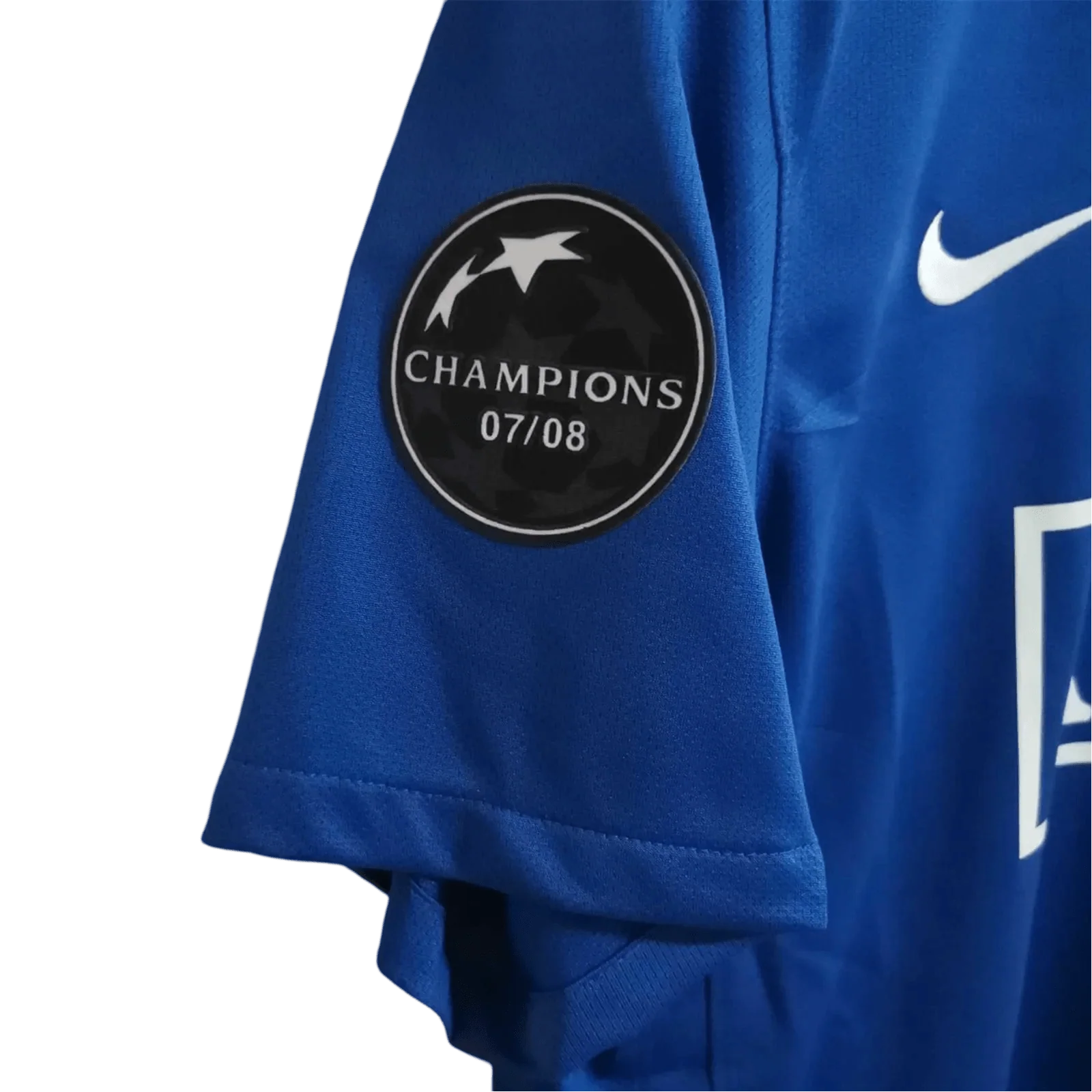 https://cdn.shopify.com/s/files/1/0826/7228/8075/files/20082009-manchester-united-aig-blue-third-retro-kit-classickits433-586291.webp?v=1741197750