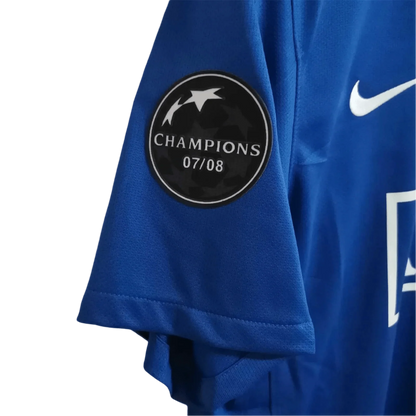 https://cdn.shopify.com/s/files/1/0826/7228/8075/files/20082009-manchester-united-aig-blue-third-retro-kit-classickits433-586291.webp?v=1741197750