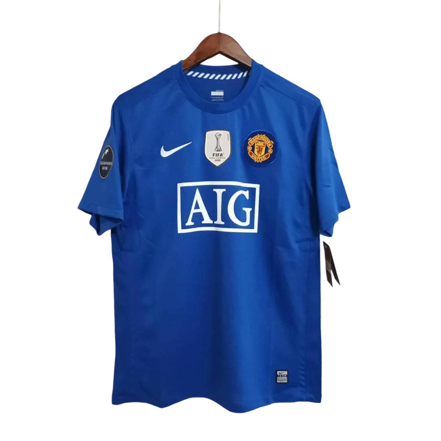 https://cdn.shopify.com/s/files/1/0826/7228/8075/files/20082009-manchester-united-aig-blue-third-retro-kit-classickits433-770389.webp?v=1741197748