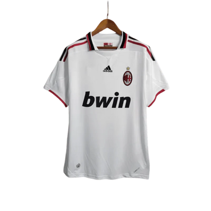 https://cdn.shopify.com/s/files/1/0826/7228/8075/files/20092010-ac-milan-bwin-away-retro-kit-short-sleeves-283151.webp?v=1741197277