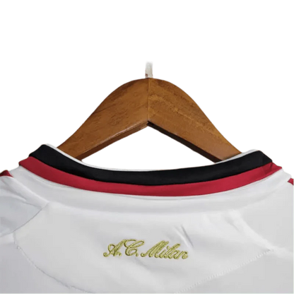 https://cdn.shopify.com/s/files/1/0826/7228/8075/files/20092010-ac-milan-bwin-away-retro-kit-short-sleeves-557333.webp?v=1741197274