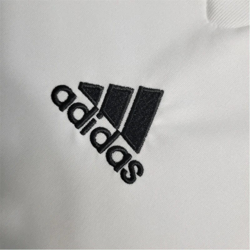 https://cdn.shopify.com/s/files/1/0826/7228/8075/files/20092010-ac-milan-bwin-away-retro-kit-short-sleeves-648842.webp?v=1741197276