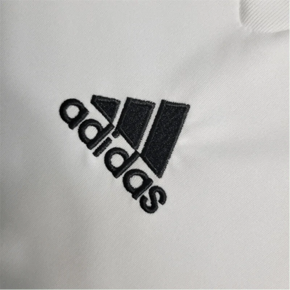 https://cdn.shopify.com/s/files/1/0826/7228/8075/files/20092010-ac-milan-bwin-away-retro-kit-short-sleeves-648842.webp?v=1741197276