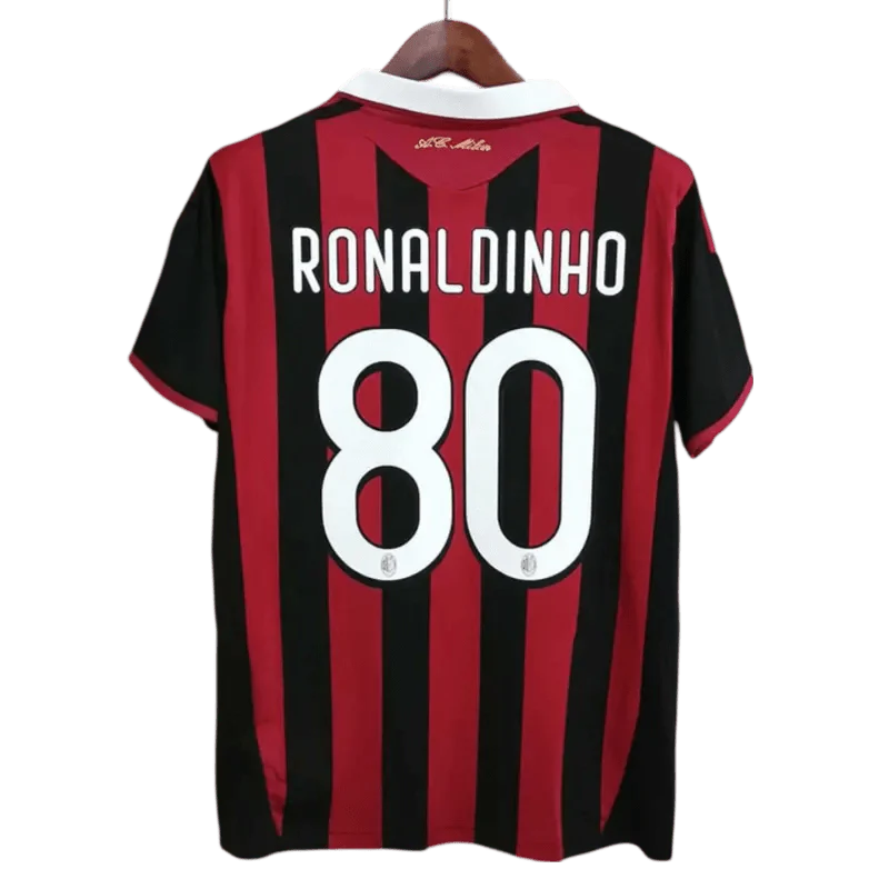 https://cdn.shopify.com/s/files/1/0826/7228/8075/files/20092010-ac-milan-bwin-home-kit-short-sleeves-158112.webp?v=1741197282