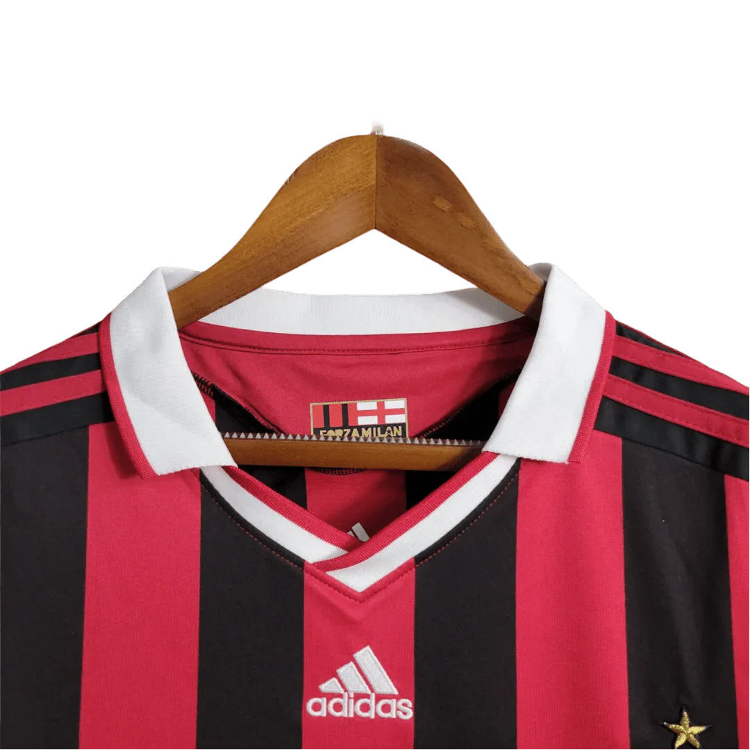 https://cdn.shopify.com/s/files/1/0826/7228/8075/files/20092010-ac-milan-bwin-home-kit-short-sleeves-451888.webp?v=1741197286