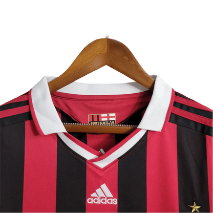 https://cdn.shopify.com/s/files/1/0826/7228/8075/files/20092010-ac-milan-bwin-home-kit-short-sleeves-451888.webp?v=1741197286