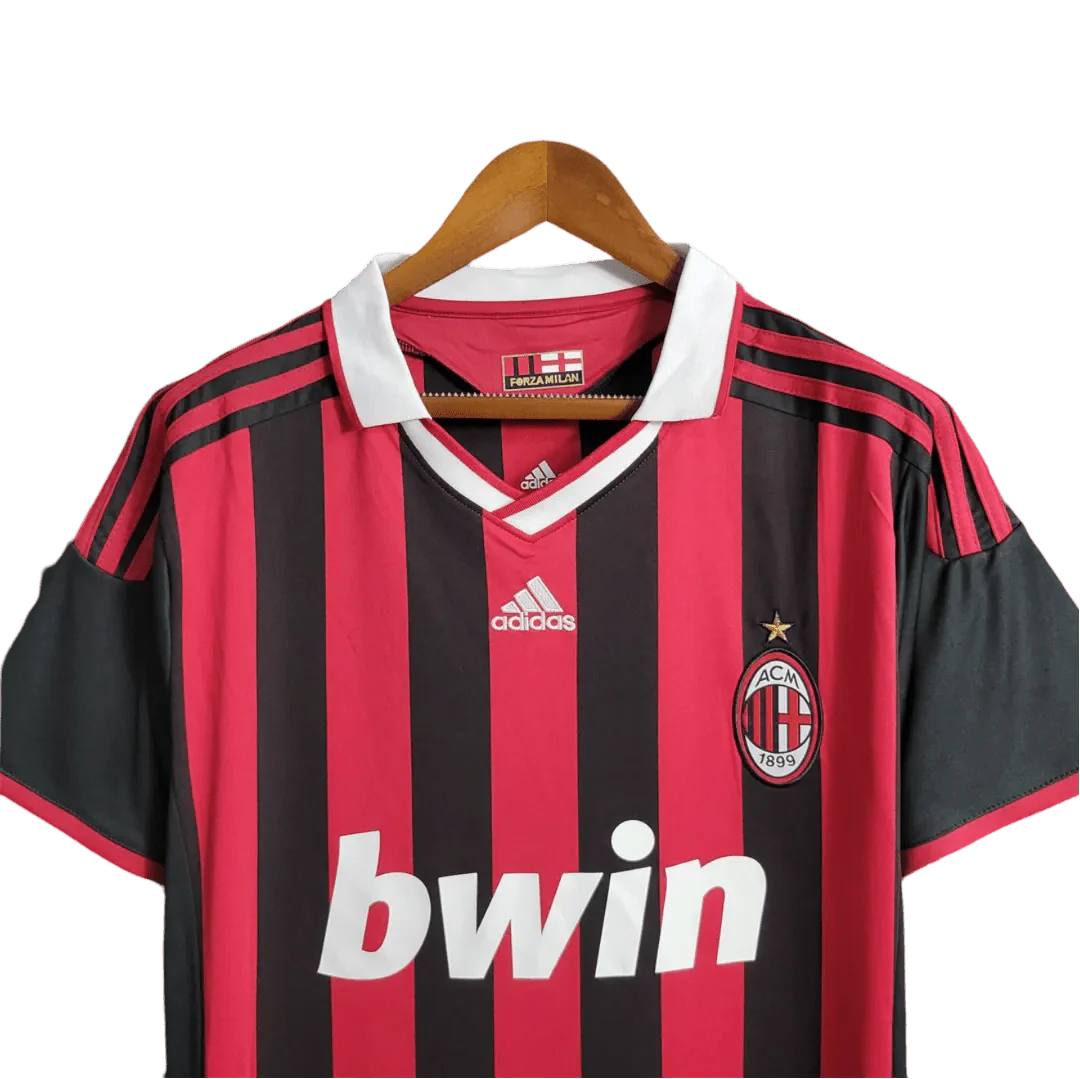 https://cdn.shopify.com/s/files/1/0826/7228/8075/files/20092010-ac-milan-bwin-home-kit-short-sleeves-632197.webp?v=1741197285