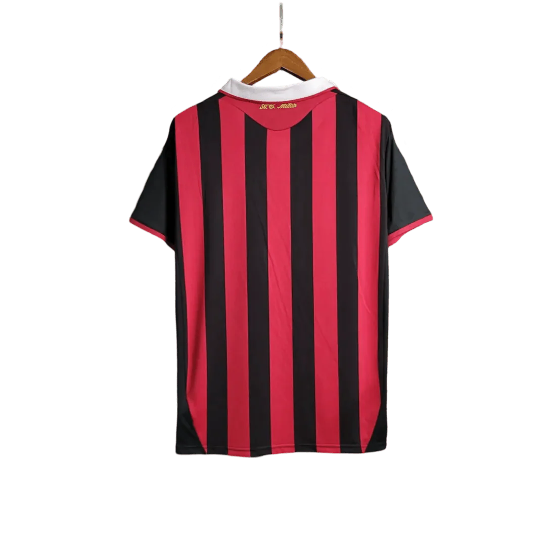 https://cdn.shopify.com/s/files/1/0826/7228/8075/files/20092010-ac-milan-bwin-home-kit-short-sleeves-655307.webp?v=1741197283