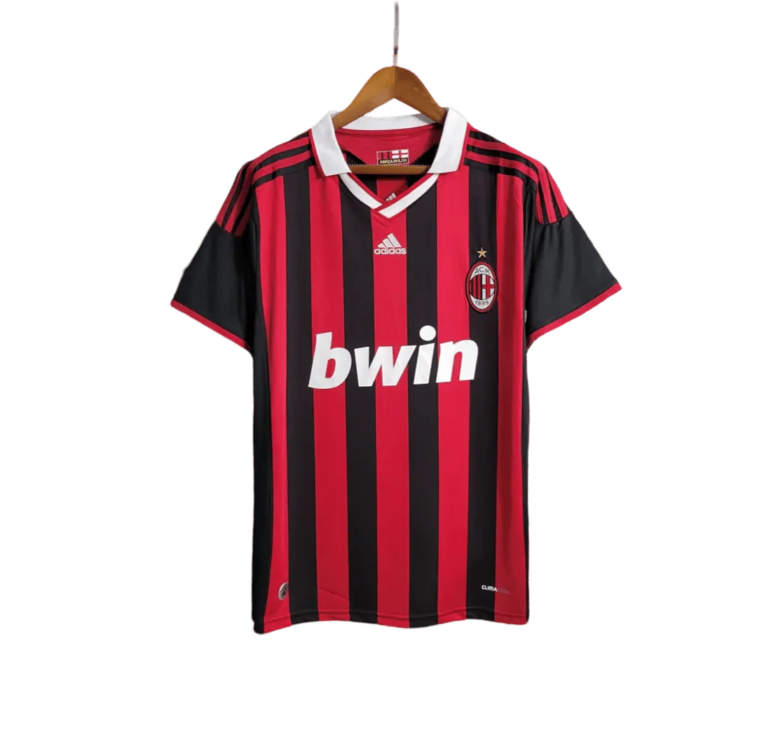 https://cdn.shopify.com/s/files/1/0826/7228/8075/files/20092010-ac-milan-bwin-home-kit-short-sleeves-821870.webp?v=1741197283