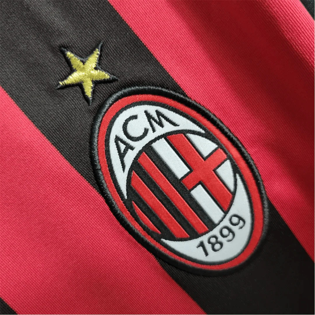 https://cdn.shopify.com/s/files/1/0826/7228/8075/files/20092010-ac-milan-bwin-home-kit-short-sleeves-901765.webp?v=1741197286