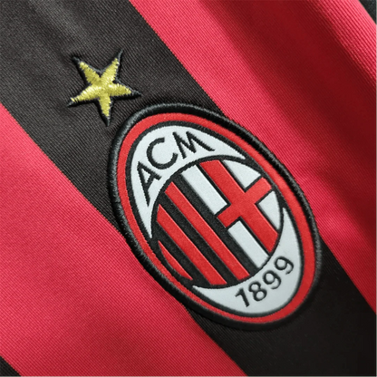 https://cdn.shopify.com/s/files/1/0826/7228/8075/files/20092010-ac-milan-bwin-home-kit-short-sleeves-901765.webp?v=1741197286