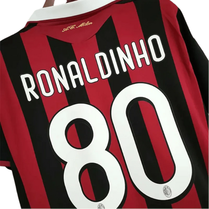 https://cdn.shopify.com/s/files/1/0826/7228/8075/files/20092010-ac-milan-bwin-home-kit-short-sleeves-996223.webp?v=1741197284